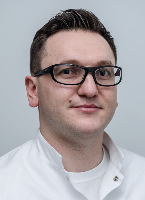 Lek. stom. Łukasz Krupiński